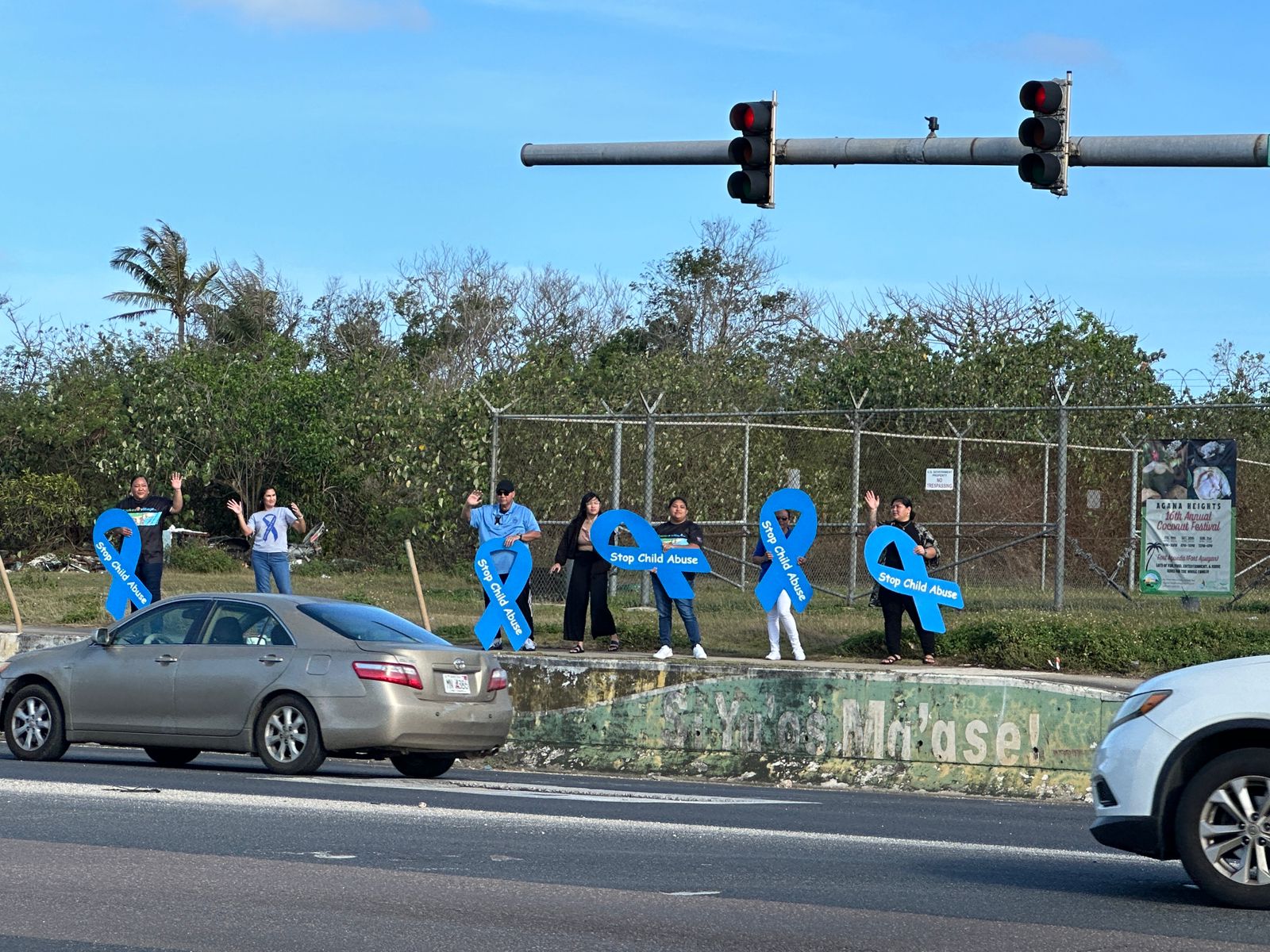 Dozens wave to kick off Child Abuse Awareness and Prevention Month - Vimarsana News